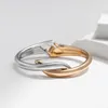 Braccialetto trasversale unico di doppio colore del braccialetto per il commercio all'ingrosso dei gioielli del regalo di nozze di amore della donna