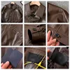 Nuovi uomini risvolto elegante giacca di pelle casual bomber ecopelle giacca da uomo design pu giacca de hombre badge moto antivento