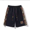 2024 verano juvenil americano Vintage bordado tejido pequeño oso tendencia Casual suelta tamaño 5/4 pantalones para hombres