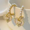 Dingle örhängen 2023 Flower Heart franska retro mode lyxiga tillbehör kvinnor smycken bröllop del