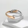 Braccialetto trasversale unico di doppio colore del braccialetto per il commercio all'ingrosso dei gioielli del regalo di nozze di amore della donna