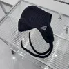 Designer beanie vinter stickad mössa ull hatt kvinnor chunky stickad tjock varm faux päls beanies hattar kvinnliga motorhuven beanie motorhuven hattar för män