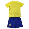 23 24 Al Nassr Kids Kit Futbol Formaları Fofana Otavio Madu al-Gannam al-amri al-Sulaiheem Alex Al-Hassan'a Söyleyin 3. Futbol Gömlekleri