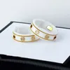 Luxurys designer ringer keramiskt band g brev ringer svart vit för kvinnor män smycken guldring storlek 6-11