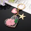 Keychains Clear Real Drooged Flower Resin Daisy Petal Heart Star Pendant Metal Key Chain Lobster Clasp Keyring Holder Party Cadeau sieraden