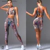 Trajes de mujer 2023 Piel de serpiente Un hombro Vientre Deporte Sujetador Mujeres Conjuntos de yoga Gimnasio Cintura alta Cross Yoga Pantalón Fitness Leggings Ejercicio ActiveSuit L230925