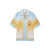 23SS Casablanca Chemise décontractée Dos Triangle d'or Carnaval Imprimer Chemises Hawaï Chemise ample à manches courtes pour hommes et femmes casablanc
