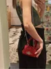 Маленькая кожаная сумка среднего размера с винтажным узором Xis на цепочке со скидкой 60% в интернет-магазине