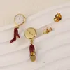 Boucles d'oreilles pendantes et lustre créatives en cristal de citrouille pour femmes, horloge, boucles d'oreilles de Niche en émail