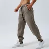 Calças masculinas soltas carta impressão cordão elástico na cintura calças outono casual jogger sweatpants com bolsos