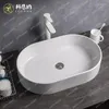 Robinets de lavabo de salle de bains, lavabo intégré en pierre artificielle ovale