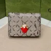 Moda cereja carteira curta feminina marca de luxo aleta dobrável bolsas sacos embreagem marca designer letras metal feminino armazenamento carteira bolso