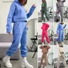 Kvinnors spårsättningar Autumn Winter Women Tracksuit Fashion Solid Fleece Sweatshirts Fe Two Piece Set Warm Big Pocket Hoodie Long Pant Sports Set L230925