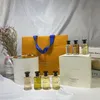 2023 Coffret Parfum 10ml 7pcs rose/ etoile filante/ cceur battant/ attrape-rêves/ matière noire/ le jour se leve/ heures d'absence avec coffret cadeau en stock