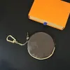 2023 nouveau porte-monnaie porte-clés pendentif rond matériau PU super résistant à l'usure sac pour femme sac de designer multicolore pendentif de sac