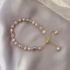 Bracelet de perles d'imitation rétro de Style français pour filles, avec une sensation haut de gamme, perles de cristal au Design Unique