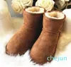 Klassisk vinter Keep Warm Short Mini Snow Boot Brand Women Populära äkta läderstövlar Fashion