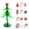 Dekorativa föremål Figurer Small Glass Christmas Tree Figurine Craft Ornaments with 12pcs Söt godis Mini Pendant 230925