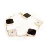 Bracelets de créateurs de luxe Trèfle Bracelet Charme Élégant Classique Mode 18K Agate Shell Vacances Mariage Couple Bijoux Cadeau Or S235O