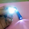 Chaveiros 100 Pçs / lote Alumínio LED Chaveiro Mini Tocha Chaveiro Chaveiro DIY Logo Cabide