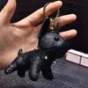 Designer Animal de bande dessinée petit chien créatif porte-clés accessoires porte-clés en cuir PU lettre motif voiture porte-clés bijoux cadeaux accessoires 6 couleurs option