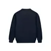 Cardigan Arrivo Cardigan lavorato a maglia per ragazzi Cappotti doppio petto stile Inghilterra Primavera Autunno Blu navy Uniforme per adolescenti Maglione per ragazze 230925