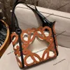 Fashion women's Tote bag designer small handbag new hollow basket leisure mother and child handbag shoulder underarm shopping bag