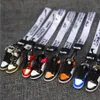 DE série marque clé Pure chaussures de basket-ball faites à la main modèle 3D hommes et femmes porte-clés de voiture chaînes individuelles Collection créative 208t