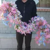 装飾的な花シミュレートされたチェリーブロッサムブドウ巻きエアコンパイプラインフラワーツリープラスチック人工装飾フロー