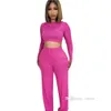 2023 Autunno Yoga Active Tuta da donna Casual Set a due pezzi Tinta unita T-shirt a maniche lunghe Crop Top e pantaloni larghi a gamba dritta Tuta da ginnastica