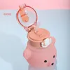 Vattenflaskor Söt kawaii -flaska för tjejbjörn plast rosa koreanska stora idrottsskolor med remmarstrå