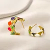 Diseñador Chicas coloridas Pendientes de esmalte Charm Marca Carta Regalos chapados en oro Pendientes colgantes Aleación Sin desvanecimiento Joyería de alta calidad Pendientes de lujo