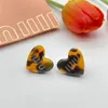 Varumärkesdesigner Love Letter Earrings Harts Acrylic Leopard Pattern Ear Studs Pearl Rhinestones Peach Heart Earring Lady Elegant smycken