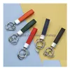 Porte-clés Lanyards 10 couleurs en cuir voiture noir bouton Sier couleur pure cuirs femmes pendentif hommes créatifs porte-clés amoureux cadeau par goutte dhxrl