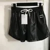 Impressão cintura elástica calças de couro moda feminina shorts com cordão padrão vintage solto moletom correndo