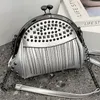 Evening Bag Bag Style Rivet Tassel Fashion Shell Korea Axel Messenger Chain Handbag Högkvalitativ lyxdesigner 230926