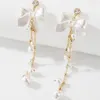 Dangle Earrings 2023エレガントな弓長模倣パールタッセルイヤリングパーティーガールズライトラグジュアリージュエリー韓国ファッションドロップ