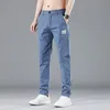 Männer Jeans Frühling Sommer Elastische Taille Design Dünne Casual Hosen Koreanische Mode Baumwolle Stretch Business Hosen Männlich Grau Blau 230925