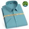 Chemises habillées pour hommes Nouvelle chemise à manches mi-longues hommes décontracté fibre de bambou porter mode travail chemise blanche hommes coupe ajustée hommes chemise boutonnée à manches courtes YQ230926