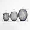 Bougeoirs Bougeoir en fer creux chandelier lanterne formes géométriques centro de mesa Table basse noire chandelier en forme de cage à oiseaux 230925