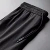 Men's Pants Sports Pants Men's Quick-drying Ice Silk Breathable Nine-point Summer Thin Running Fitness Loose Mesh Air-conditioning Trousers 230926