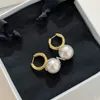 Orecchini a bottone in oro con perle Orecchini da donna con stilista Gioielli di perle per gioielli regalo di nozze Wemon