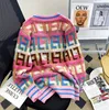 Kobiet Sweters Designer Luksus 2024 Nowy przylot Piękna swetry kurtka dla kobiet wczesna wiosna Rainbow Letter Elegancka niszowa dzianina z krawędzi.