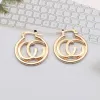 Charm Womens 18K Gold Plated Earring EAR STUD 고급 브랜드 디자이너 레터 레지 트릭 과장 클래식 웨딩 파티 Jewerlry 레트로 스타일 ER0130