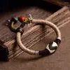 Charmarmband handvävd tibetansk tiger tandarmband dzi pärla sträng manlig litterär spelare retro folkstil handdekorerad carver