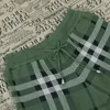 Designer de alta qualidade verde xadrez shorts moda xadrez malha cordão rendas clássico retro masculino e feminino shorts soltos