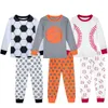 衣料品セットキッズ幼児の男の子のためのパジャマサッカーバスケットボール野球睡眠