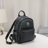 New Soft Leather Casual Punk Students Rivets Rucksacks Gothic Casual Travel Skull Backpacks Fashion Trendy Preppy Women's Backpacks
