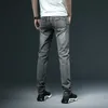 Herrtröjor tröjor mager vita jeans mode casual elastisk bomull smal denim byxor man varumärke kläd svart grå khaki 230925