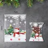 Décorations de Noël 50pcs Sac de bonbons de pâtisserie Flocon de neige Biscuits croustillants Biscuits de bande dessinée Porte-cadeaux Fournitures d'emballage